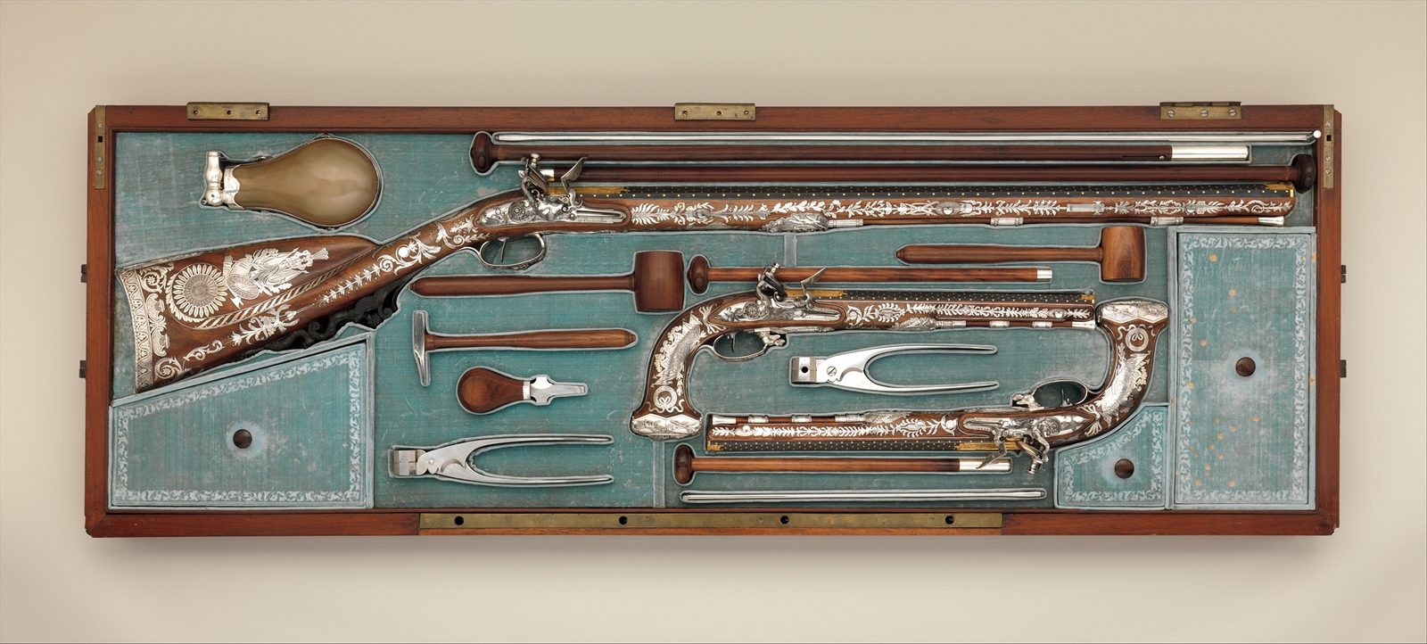 Cased Set of a Flintlock Rifle, a Pair of Pistols, and Accessories — Met 1970.179.1a–q